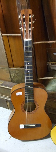 A `Hi-Spot` Acoustic Guitar.