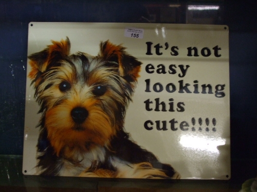A Reproduction Metal Sign, `Its Not Easy Looking this Cute`.