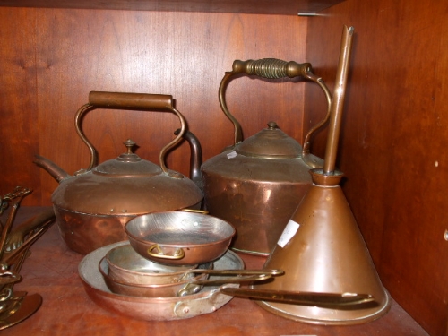 A Quantity of Copper Items including two kettles, funnel, pans, etc.