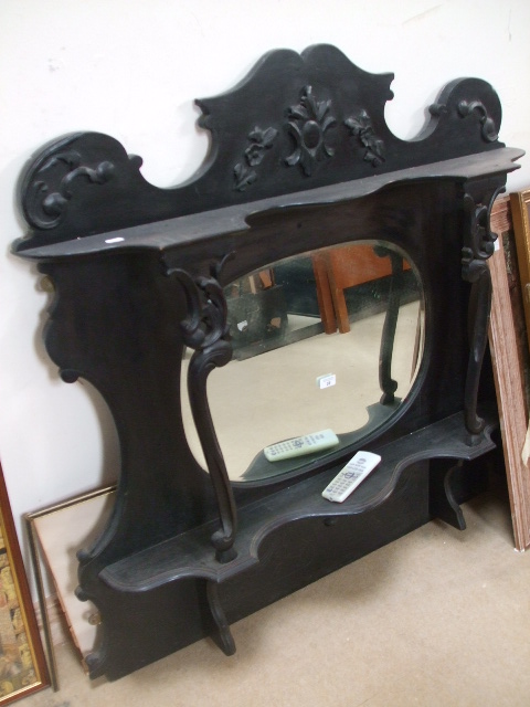 An Ebony Overmantel Mirror.