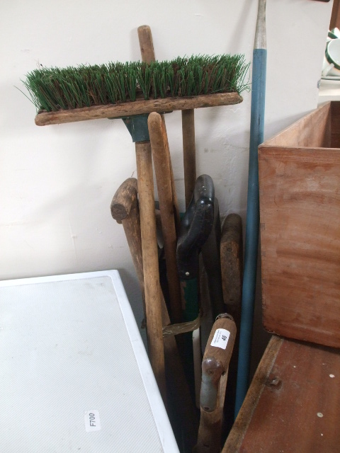 A Quantity of Gardening Tools, to include brushed, rake, spade, etc.