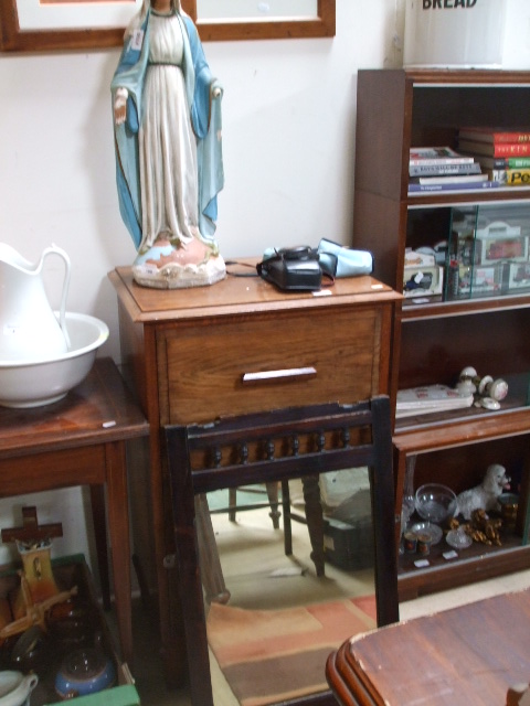 An Edwardian Mahogany and Inlaid Side Table, along with a light oak chest of three short drawers and