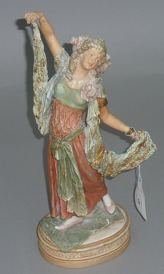 Royal Dux figure of a maiden in 18th Century dress dancing with her shawl outstretched, mounted on