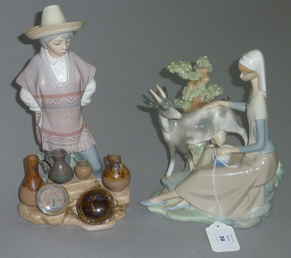 Lladro figure of a girl with goat and a pueblo Indian.
