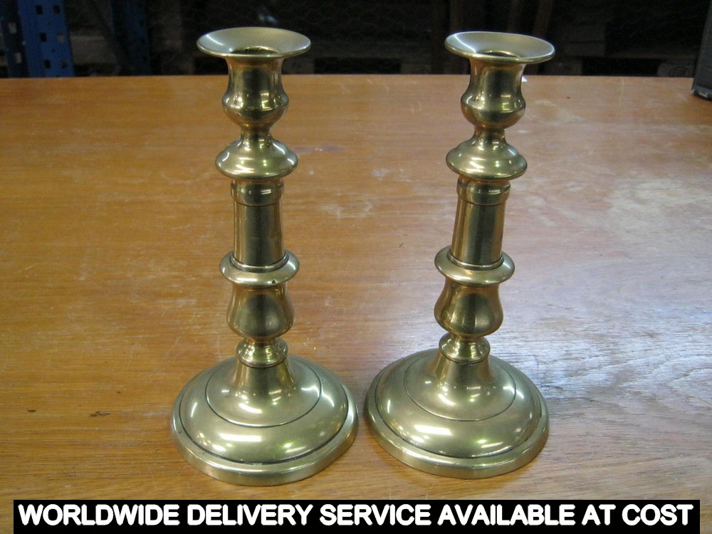 Pair of brass candlesticks - 8ins approximately