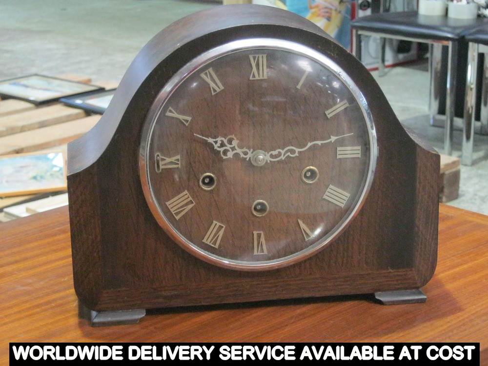 Oak domed case mantle clock with chiming movement