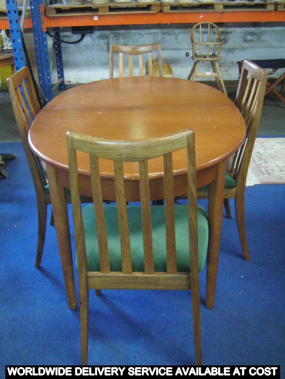 Four G-plan dining chairs with a similar table