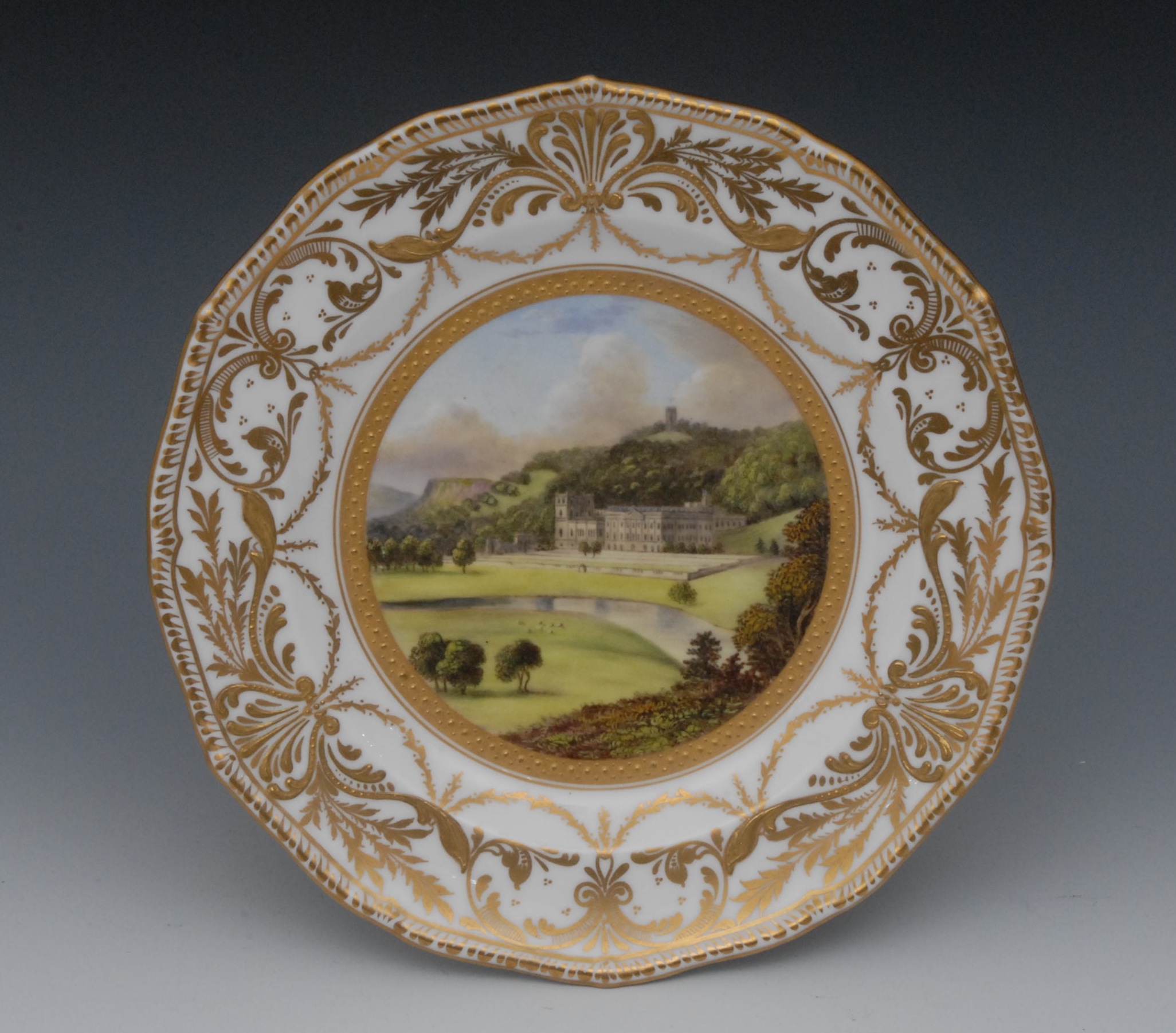 A Sampson Hancock shaped circular plate, painted by Harry Sampson Hancock, signed, Chatsworth House,