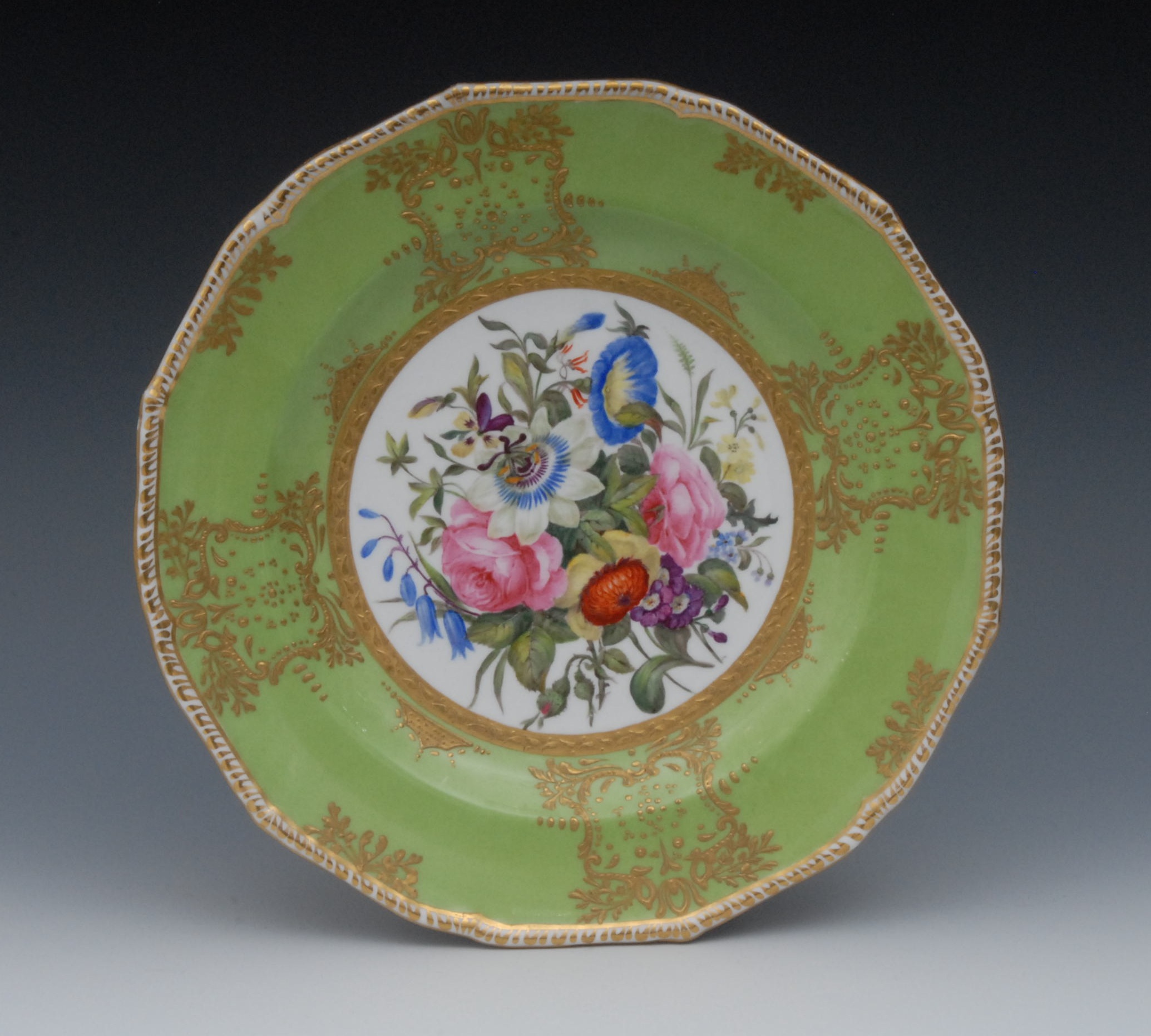 A Sampson Hancock shaped circular plate, painted by Harry Sampson Hancock, signed, with colourful