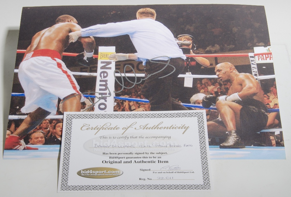Signed by Williams, a boxing photograph of Tyson & Danny Williams - size 16" x 12" with