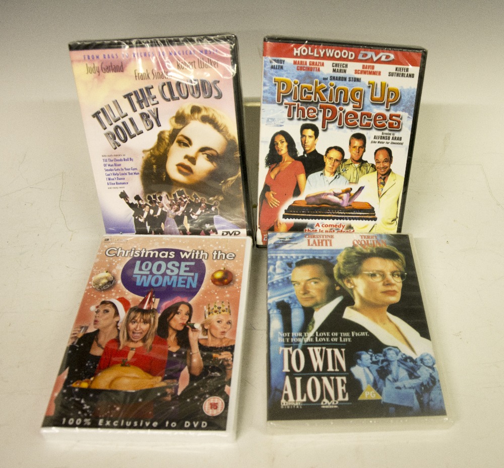 A collection of DVD`s including, Picking Up The Pieces, Till The Clouds Roll By,To Win Alone, and