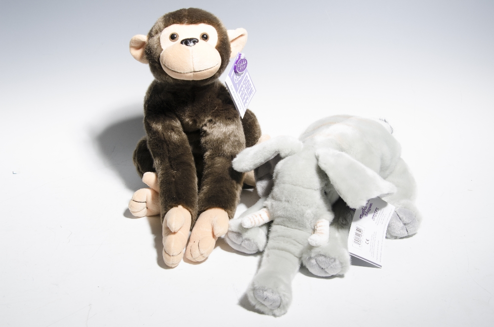 A cuddly chimp and an elephant