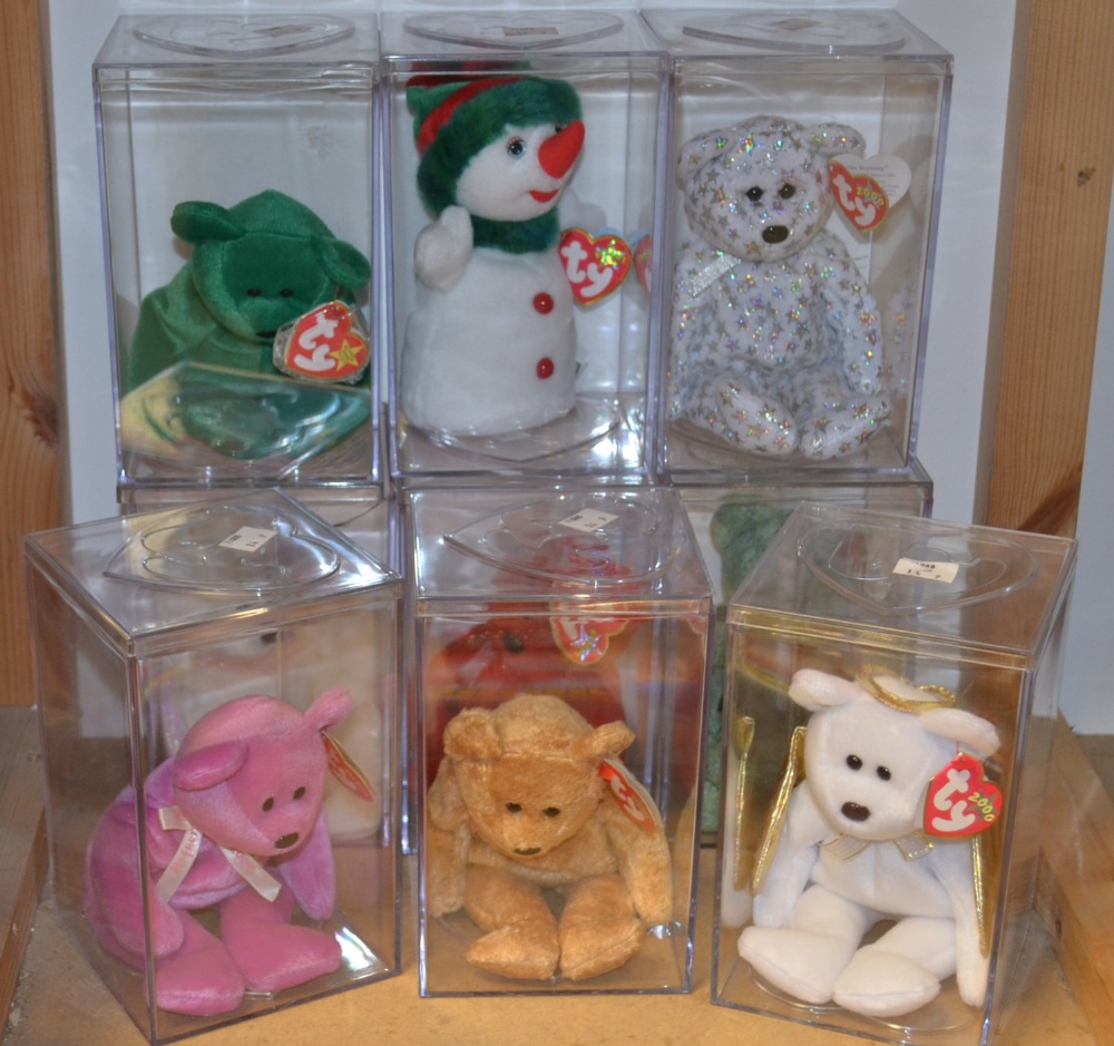 TY Bears and a Snowman, nine various, each displayed in a perspex case