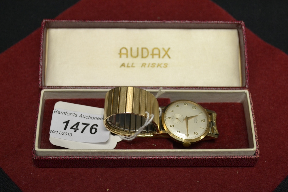 An Audax yellow metal cased incabloc Gentleman`s wristwatch, expanding bracket strap, boxed