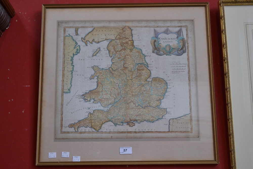 A framed map of England by Robert Morden, later tinted, framed