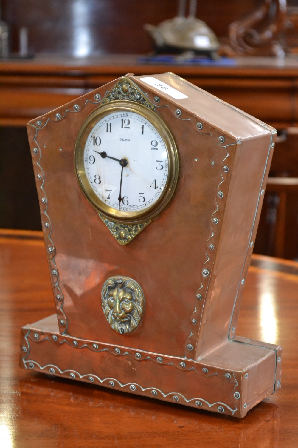 A French copper eight-day mantel clock, early 20th century