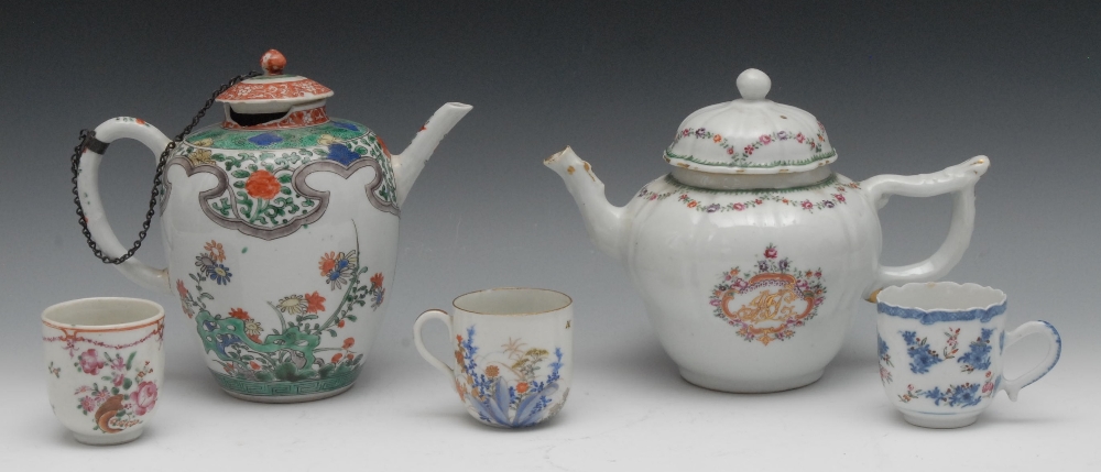A Chinese ogee shaped teapot and cover, printed with cartouche and initials, surrounded by roses and