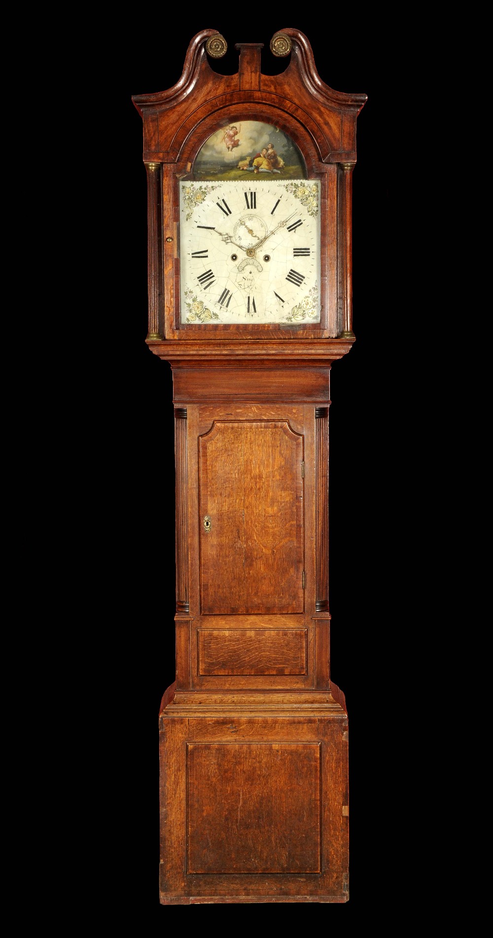 A William IV oak and mahogany longcase clock, 33cm arched painted dial with Roman numerals, the arch