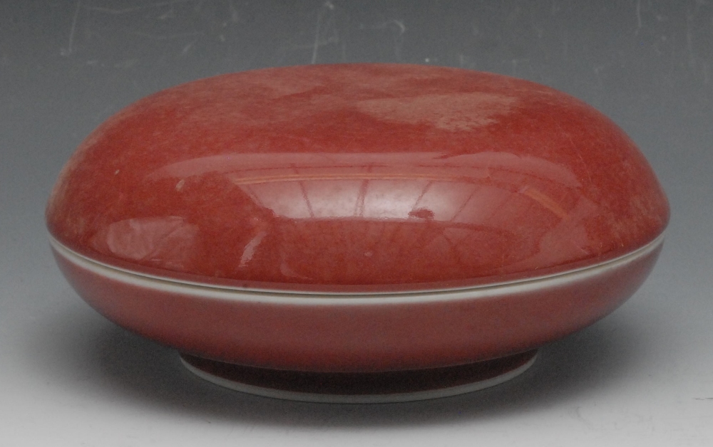 A Chinese powdered red bowl and cover, 14cm diam, Kangxi marks