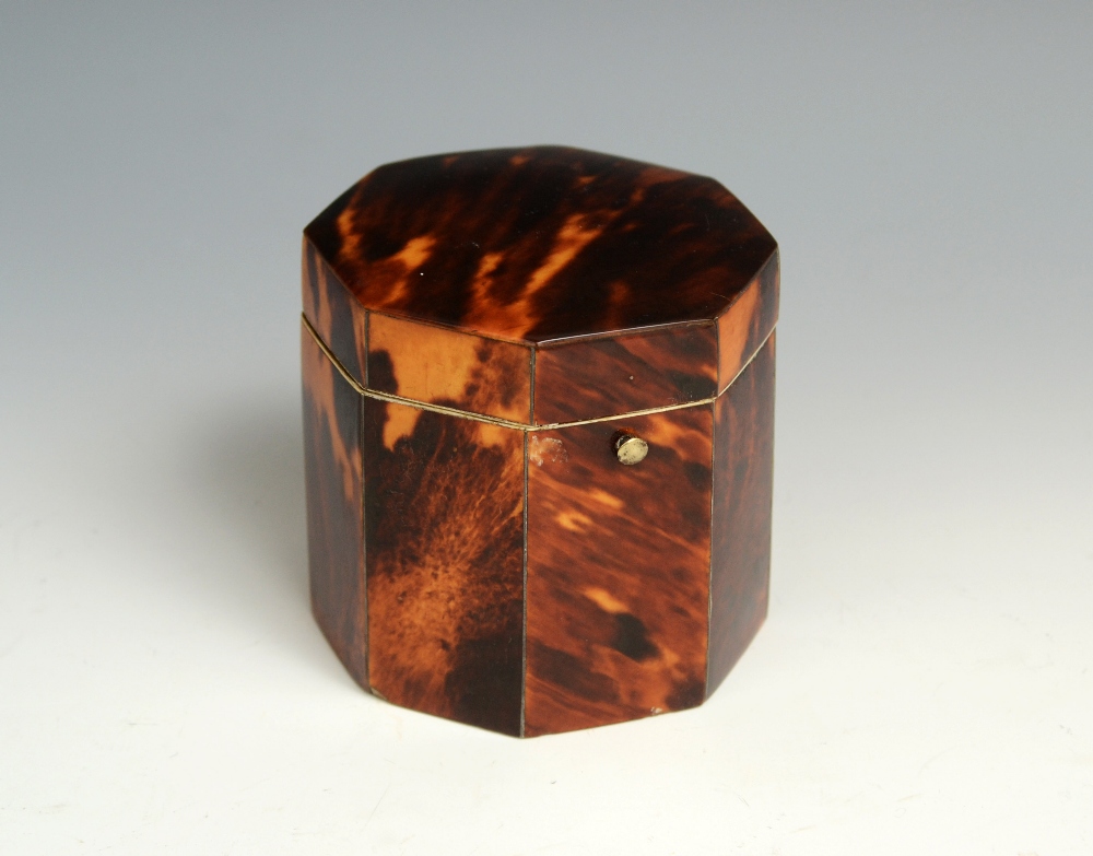 A 19th century tortoiseshell octagonal tea caddy, of small proportions, hinged cover, 7.5cm high,