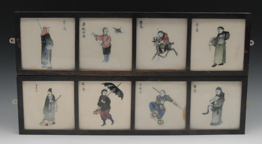 A set of eight Chinese tiles, painted with figures and characters, in colours, framed as two, each