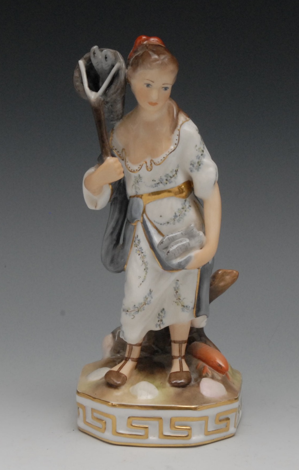 A Royal Crown Derby figures, Allegorical of The Element,  Water, with net over her shoulder and fish