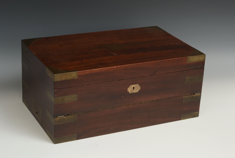 A 19th century brass bound mahogany campaign portable desk box, hinged cover enclosing a folding