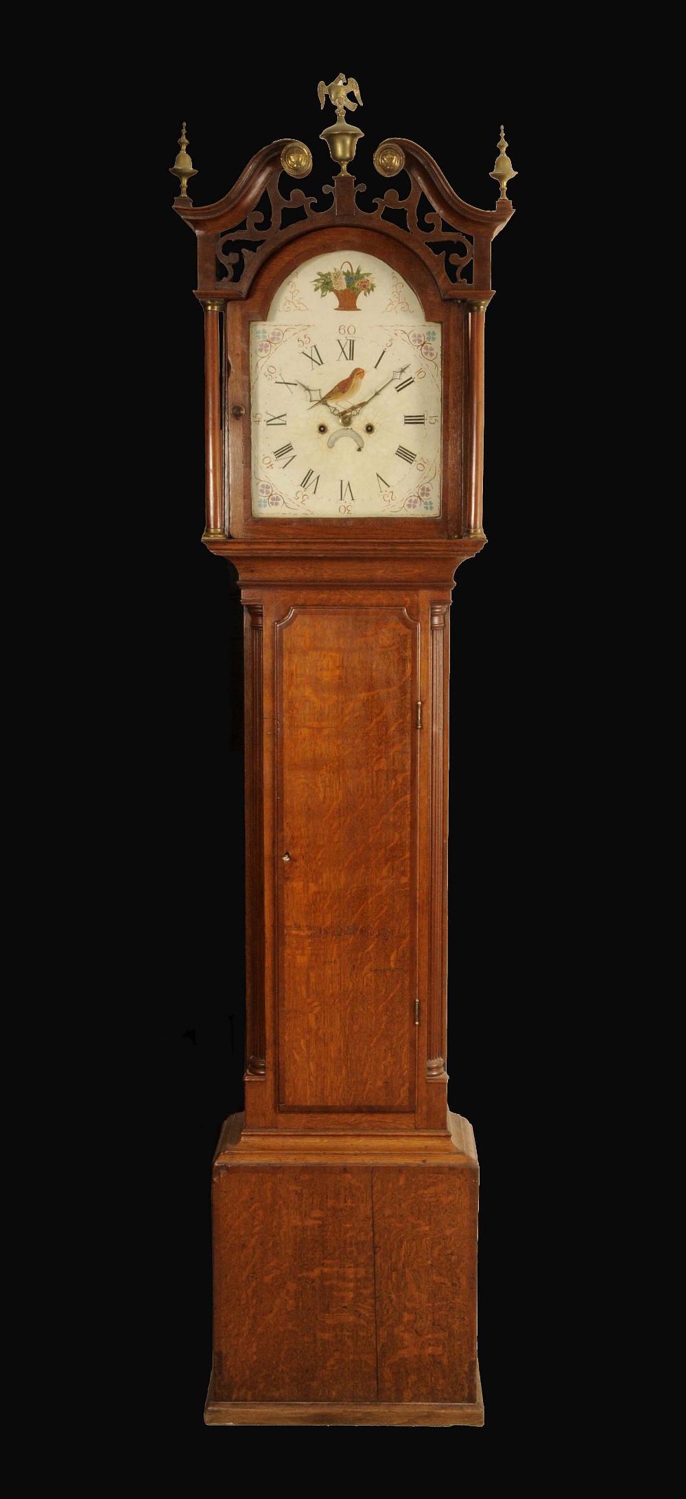 A George III mahogany crossbanded oak longcase clock, 31cm arched enamel dial inscribed with Roman