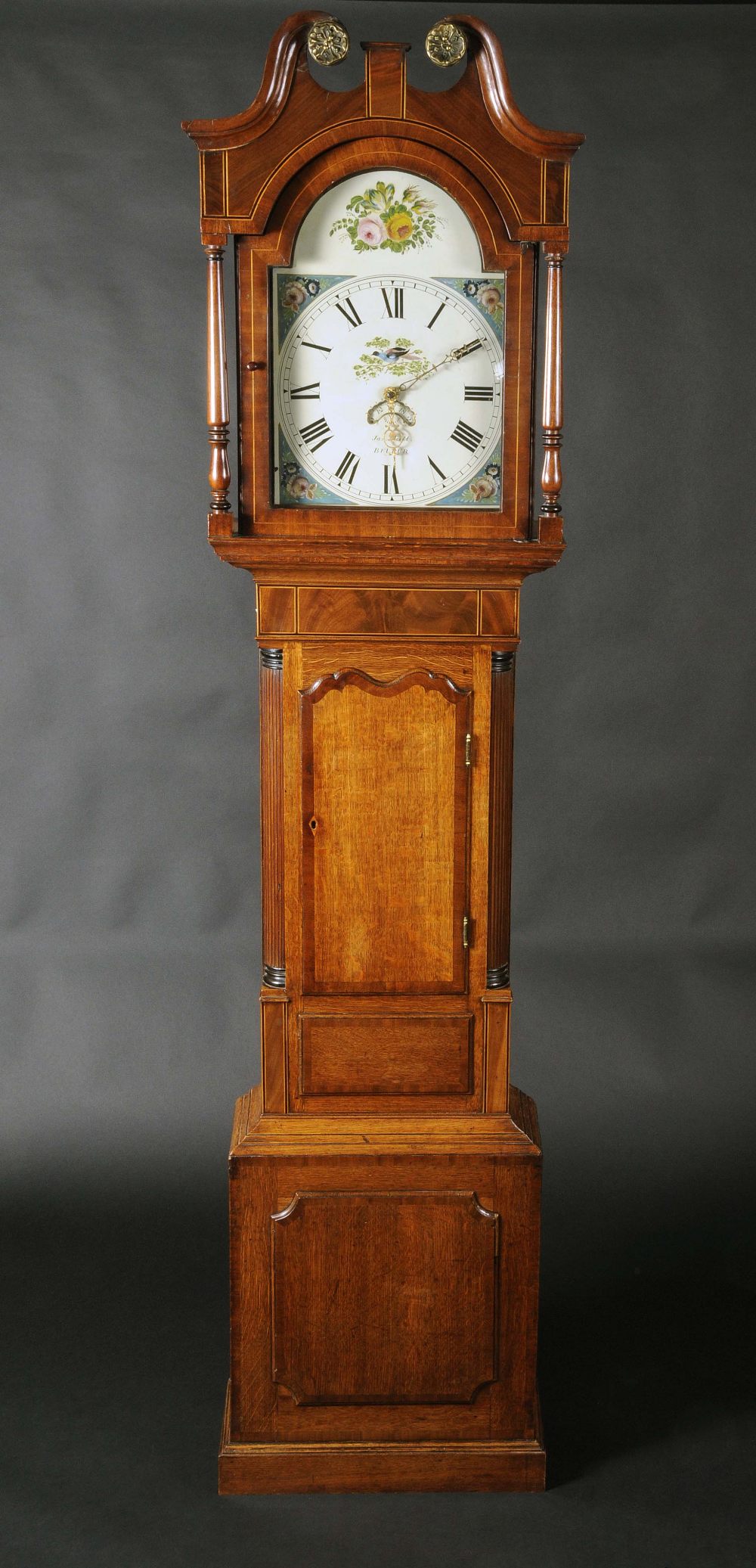 A 19th century mahogany crossbanded and oak longcase clock, 33cm arched painted dial, inscribed