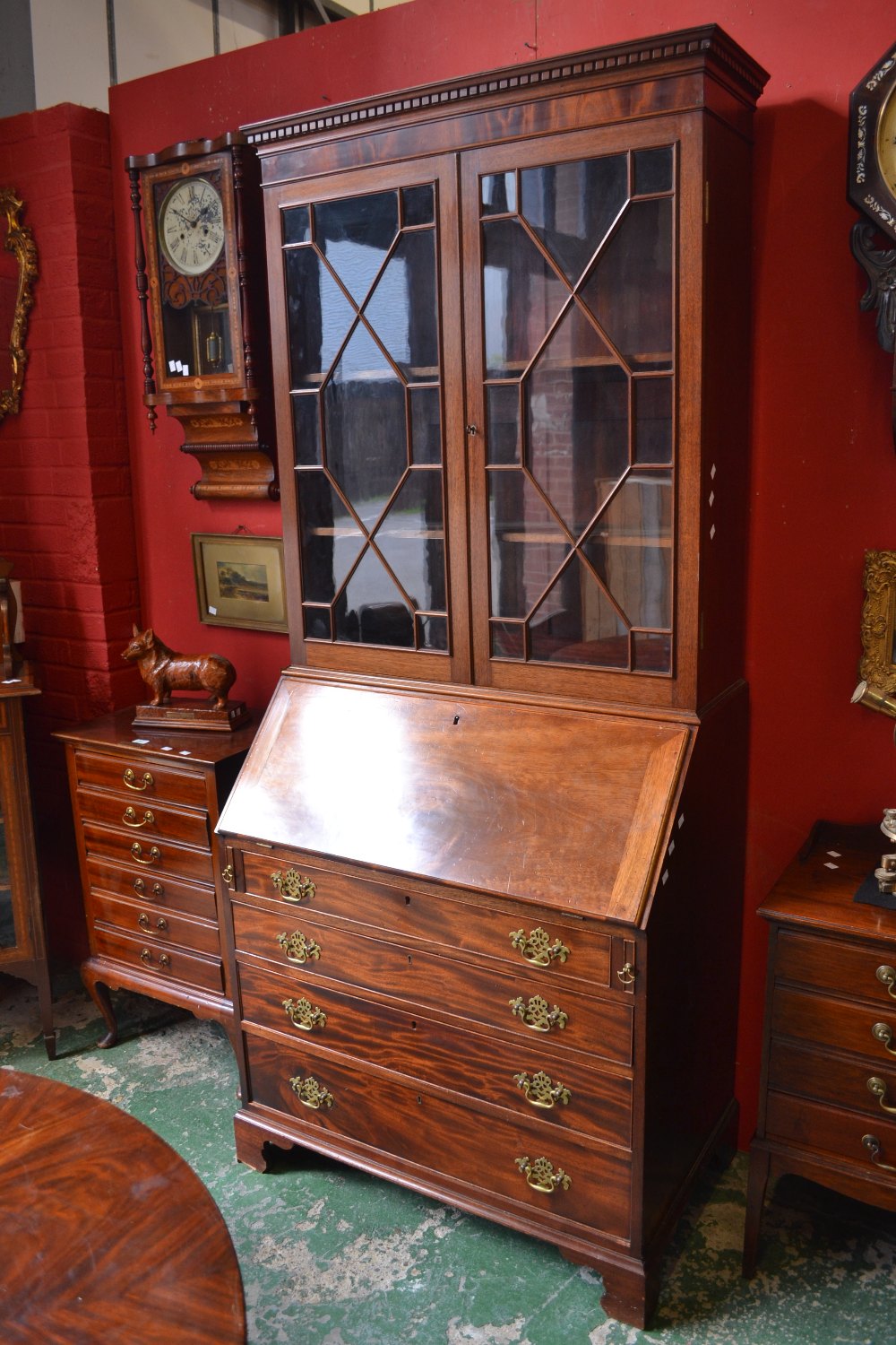 A Victorian mahogany bureau bookcase, in George III style, with fitted interior