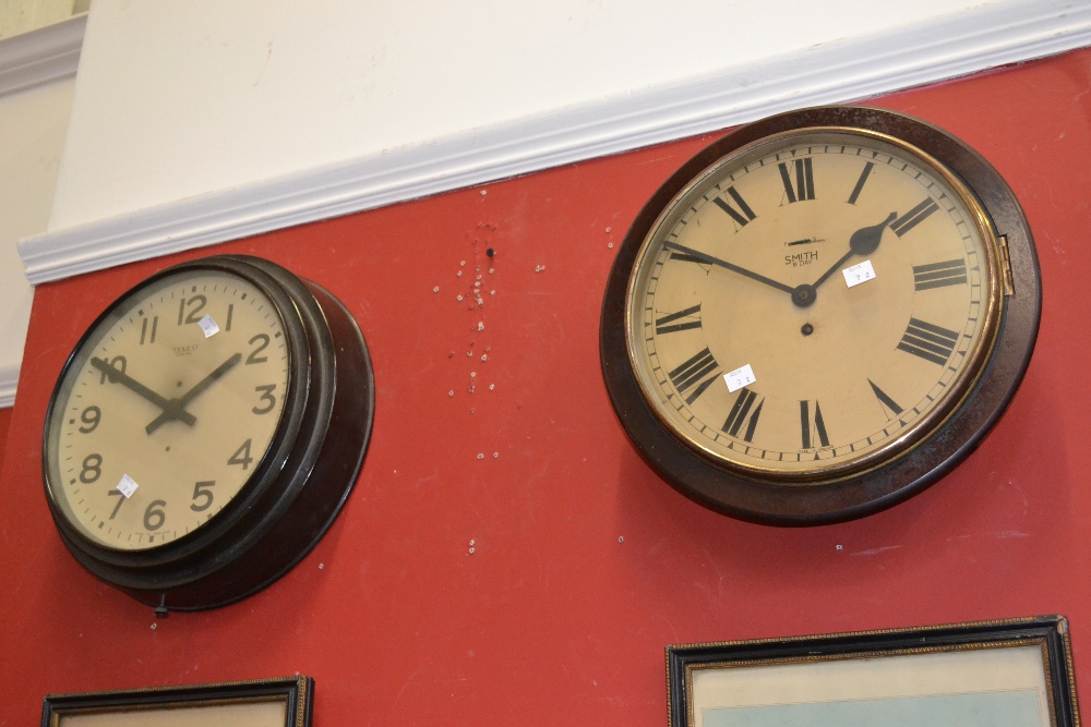 A Smith`s eight day circular wall clock, with keys; Temco electric circular wall clock (2)
