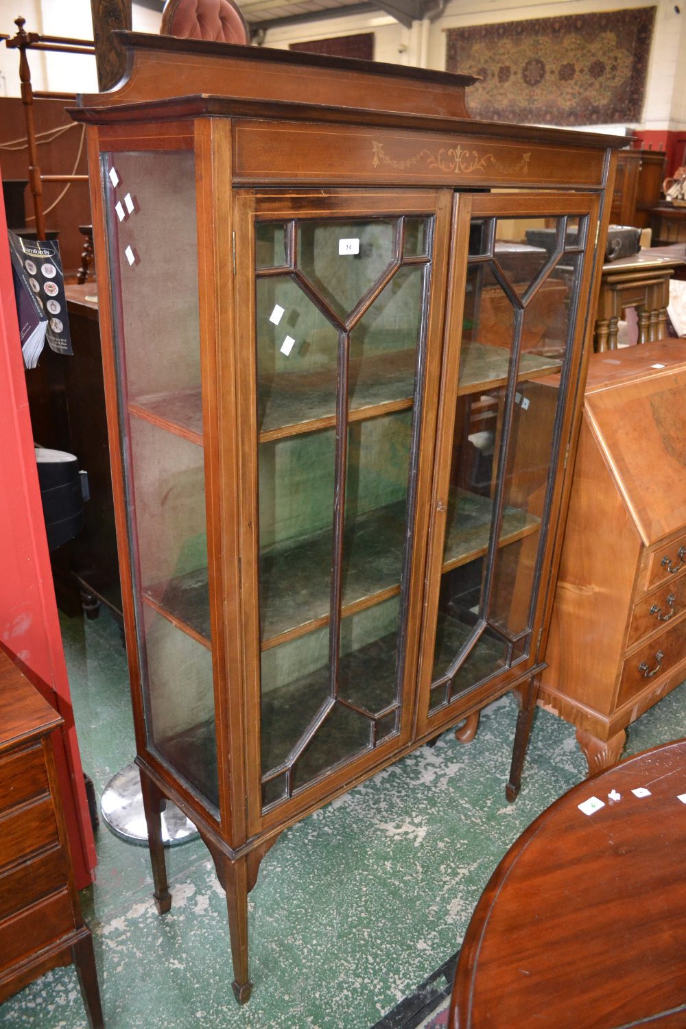 An Edwardian mahogany inlaid China cabinet