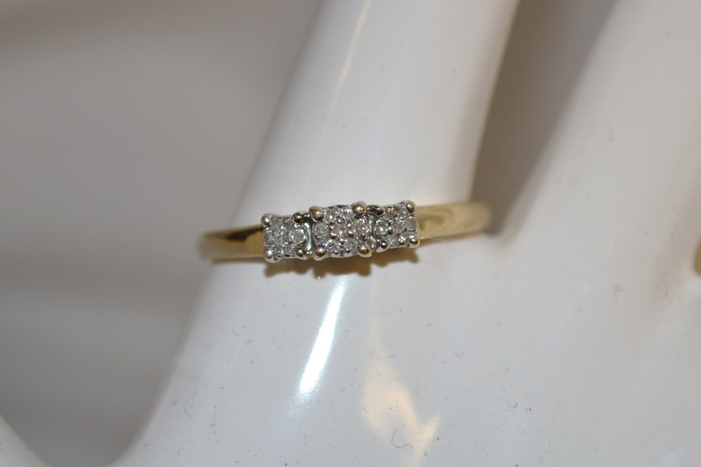 A modern diamond cluster dress ring, 9ct mount