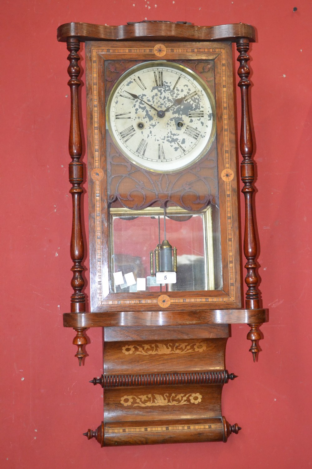 A walnut and marquetry inlaid drop dial wall clock