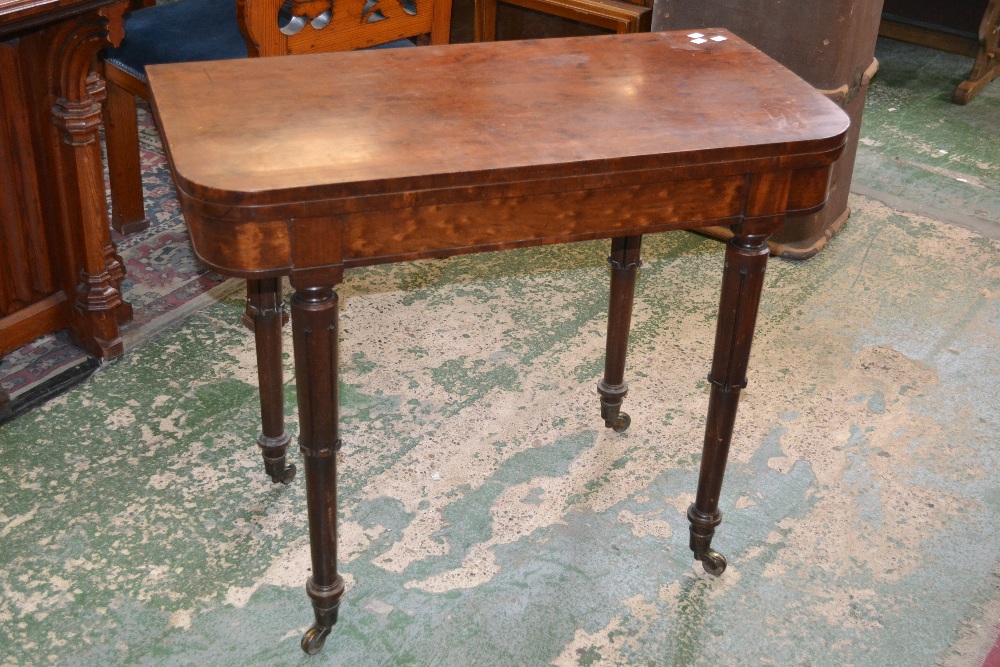 An early Victorian mahogany card table