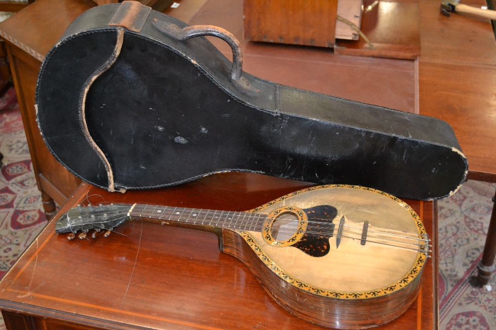 An early 20th century Neapolitan flat back mandolin, cased