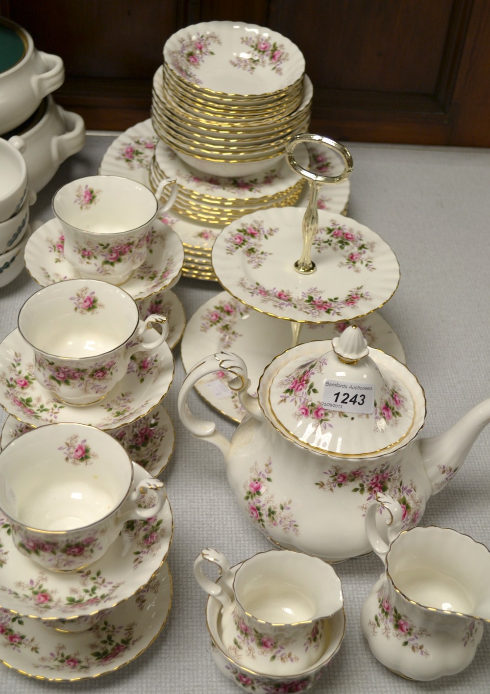 A Royal Albert Lavender Rose pattern, tea pot, milk and sugar, six cups, saucers and tea plates,