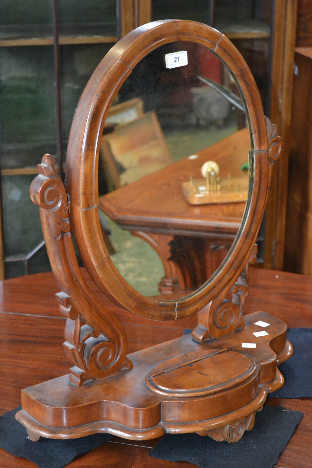 A walnut dressing mirror