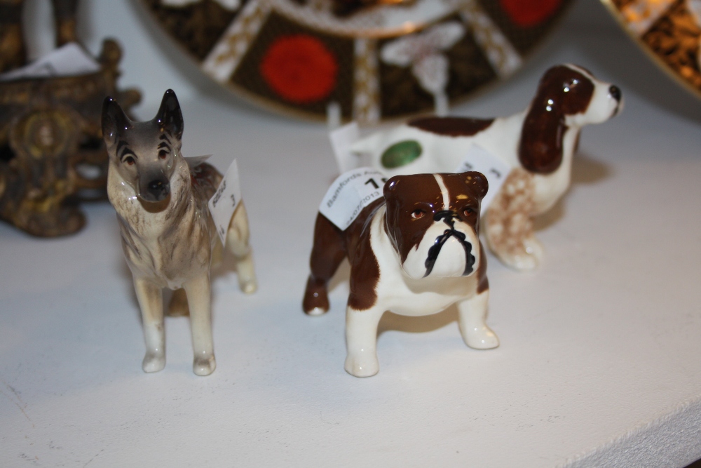 Three Beswick dogs, Alsatian, gloss, model no. 1762;  a spaniel, gloss, model no. 1754; a bulldog,