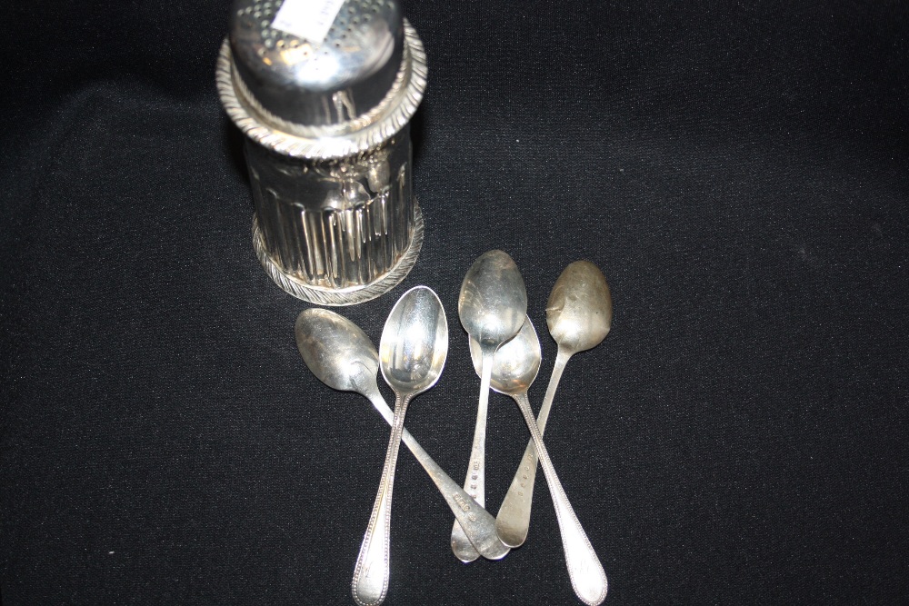 A silver plated sugar caster; four silver teaspoons