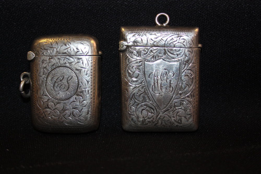 A Victorian silver vesta case; another (2)