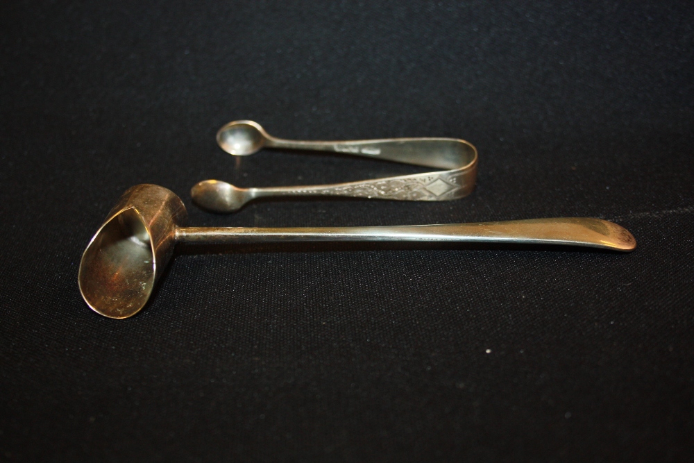 A pair of silver bright cut sugar bows, Sheffield 1905, an EPNS feeder spoon (2)