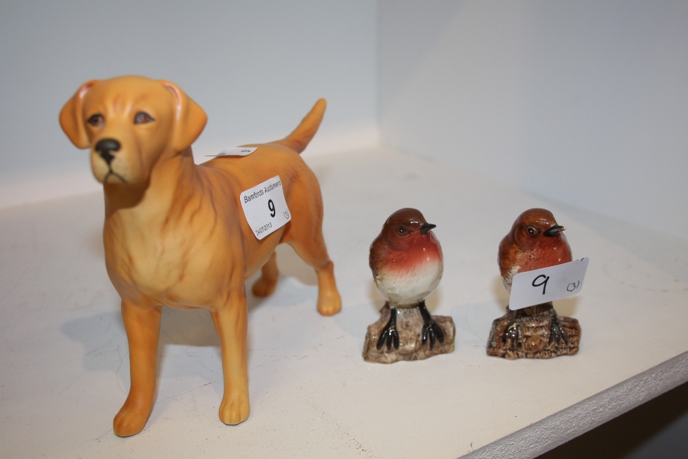 A Beswick golden Labrador dog; a Beswick No.980 Robin, another (3)