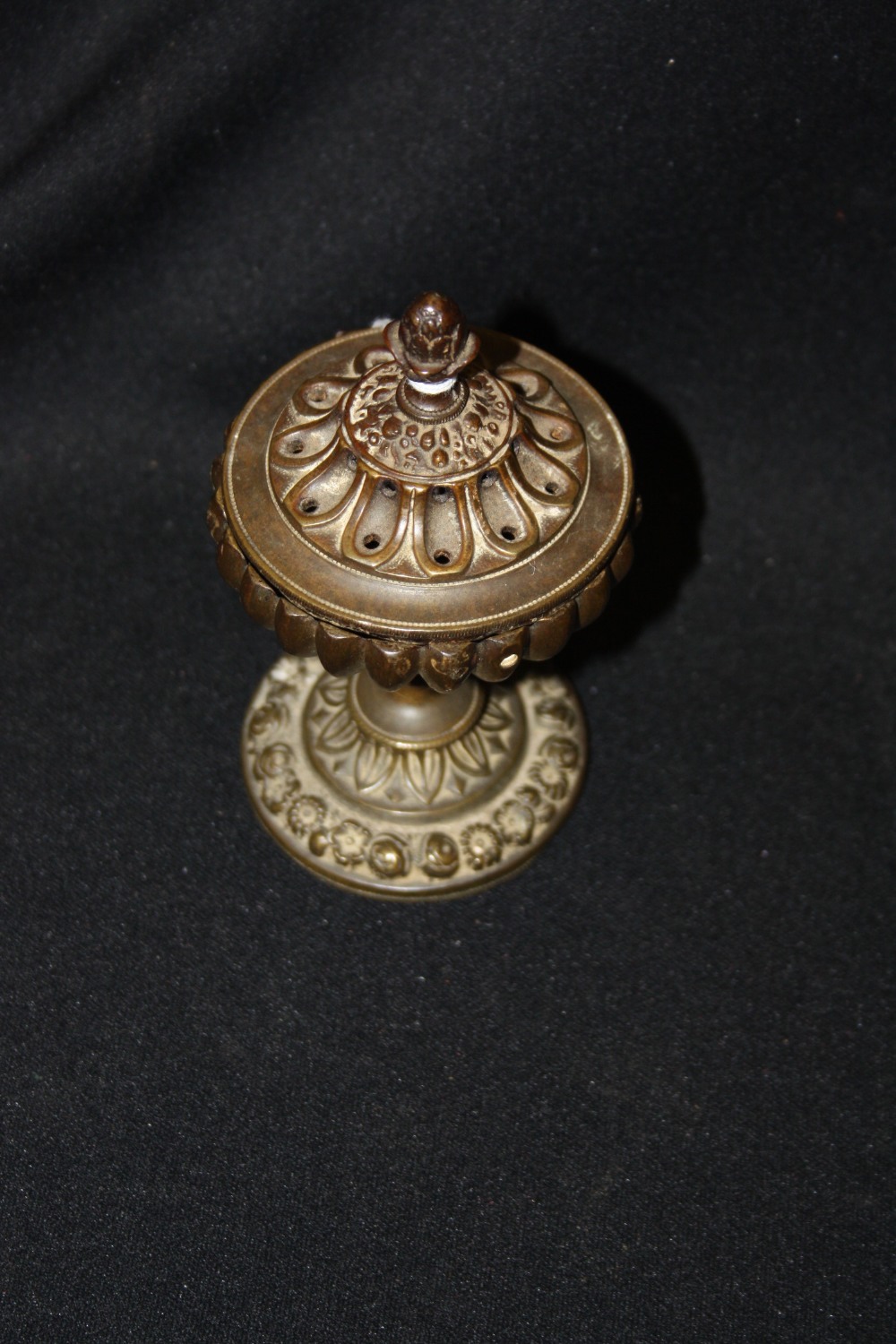 A Regency dark patinated bronze pedestal pastille burner, c.1820