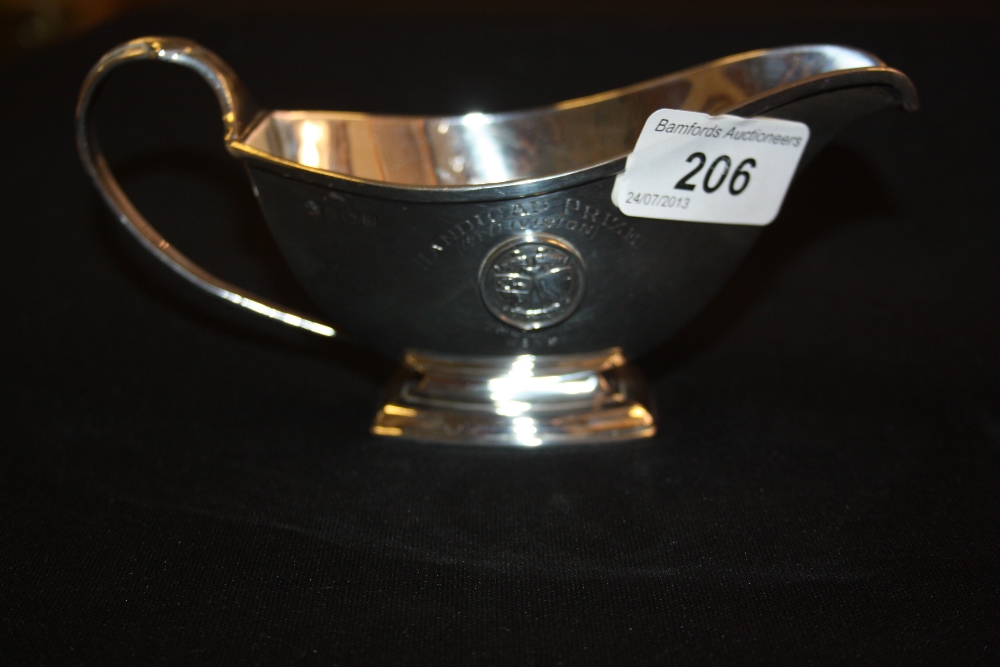 A silver Art deco sauce boat