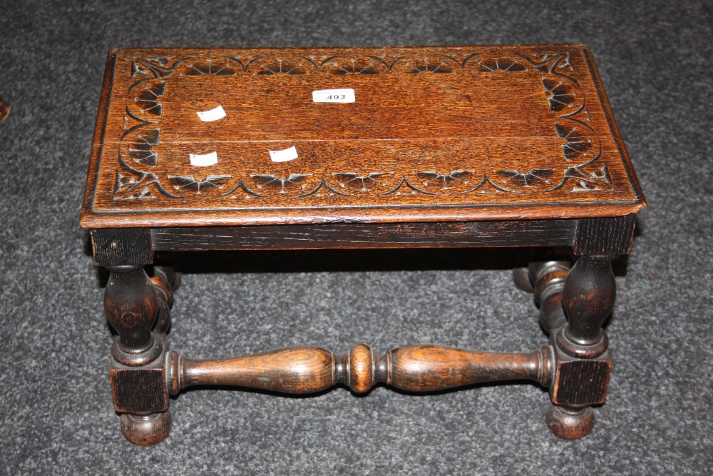 A 20th century carved footstool with turned supports; and another(2)