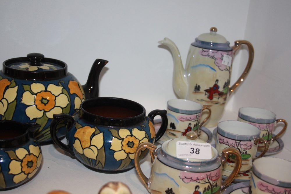 A Torquay three piece tea service; an eggshell tea service