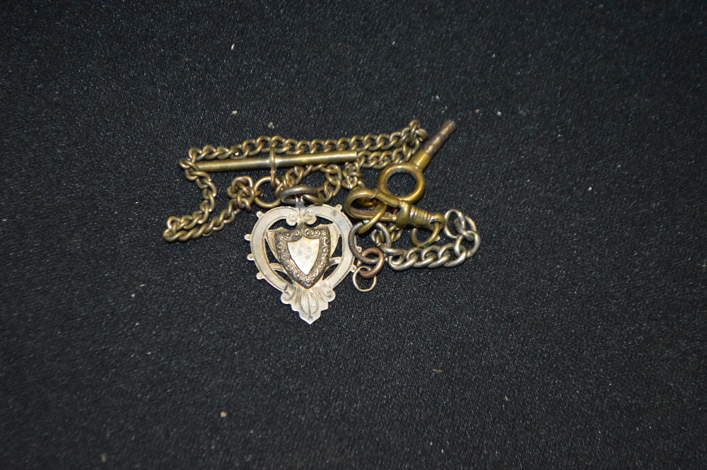 A silver Albert fob, chains, etc