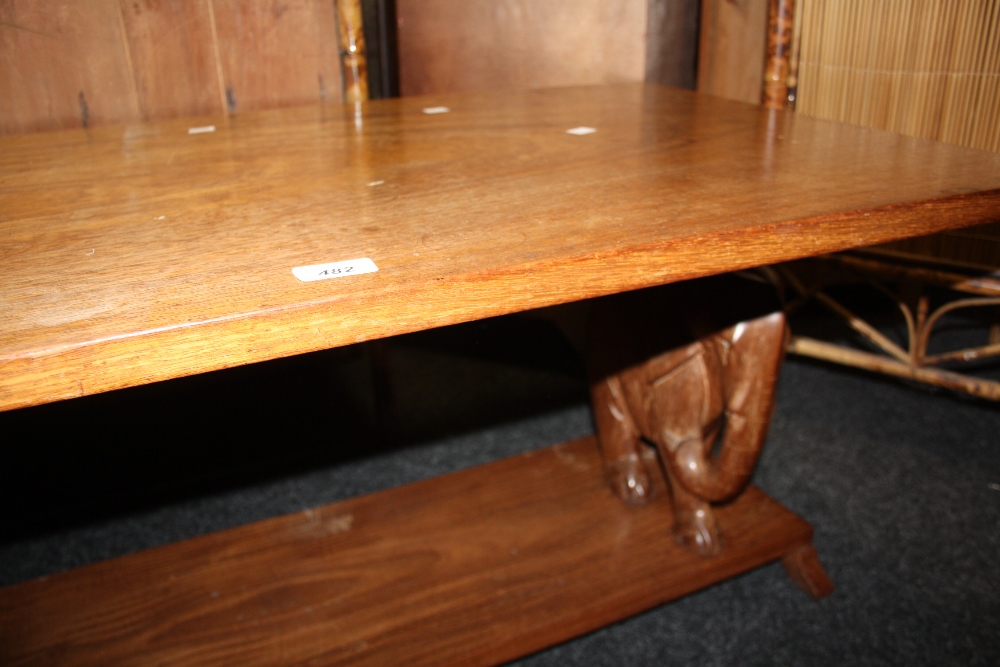 A hardwood elephant rectangular table