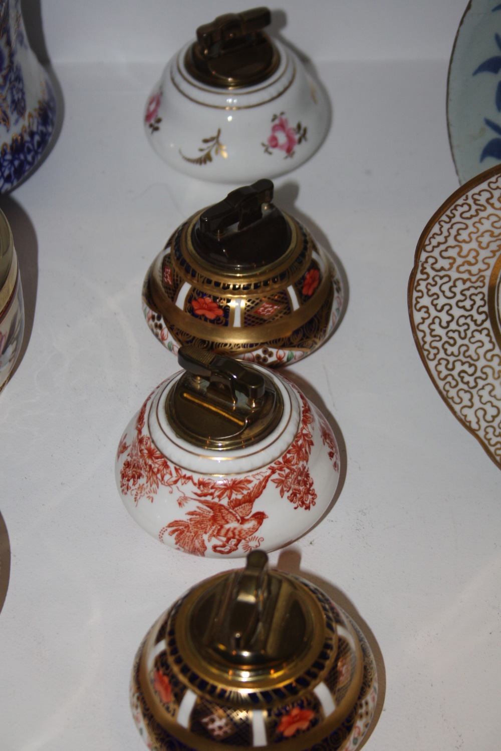 A Royal Crown Derby 1128 pattern table lighter; another; others (4)